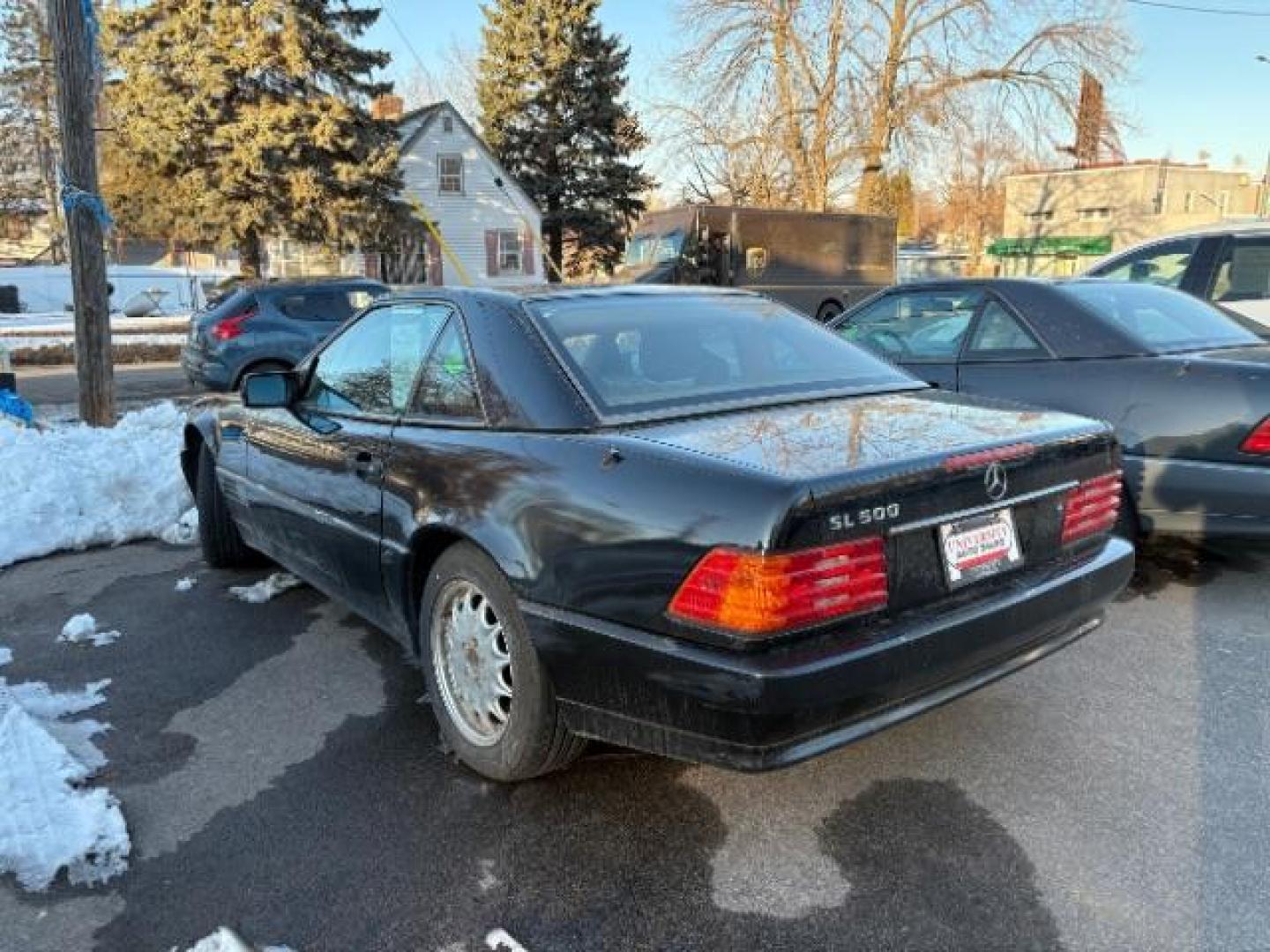 1994 BLACK Mercedes-Benz SL-Class SL500 Roadster (WDBFA67E1RF) with an 5.0L V8 DOHC 32V engine, 4-Speed Automatic transmission, located at 745 S Robert St, St. Paul, MN, 55107, (651) 222-2991, 44.923389, -93.081215 - Photo#2