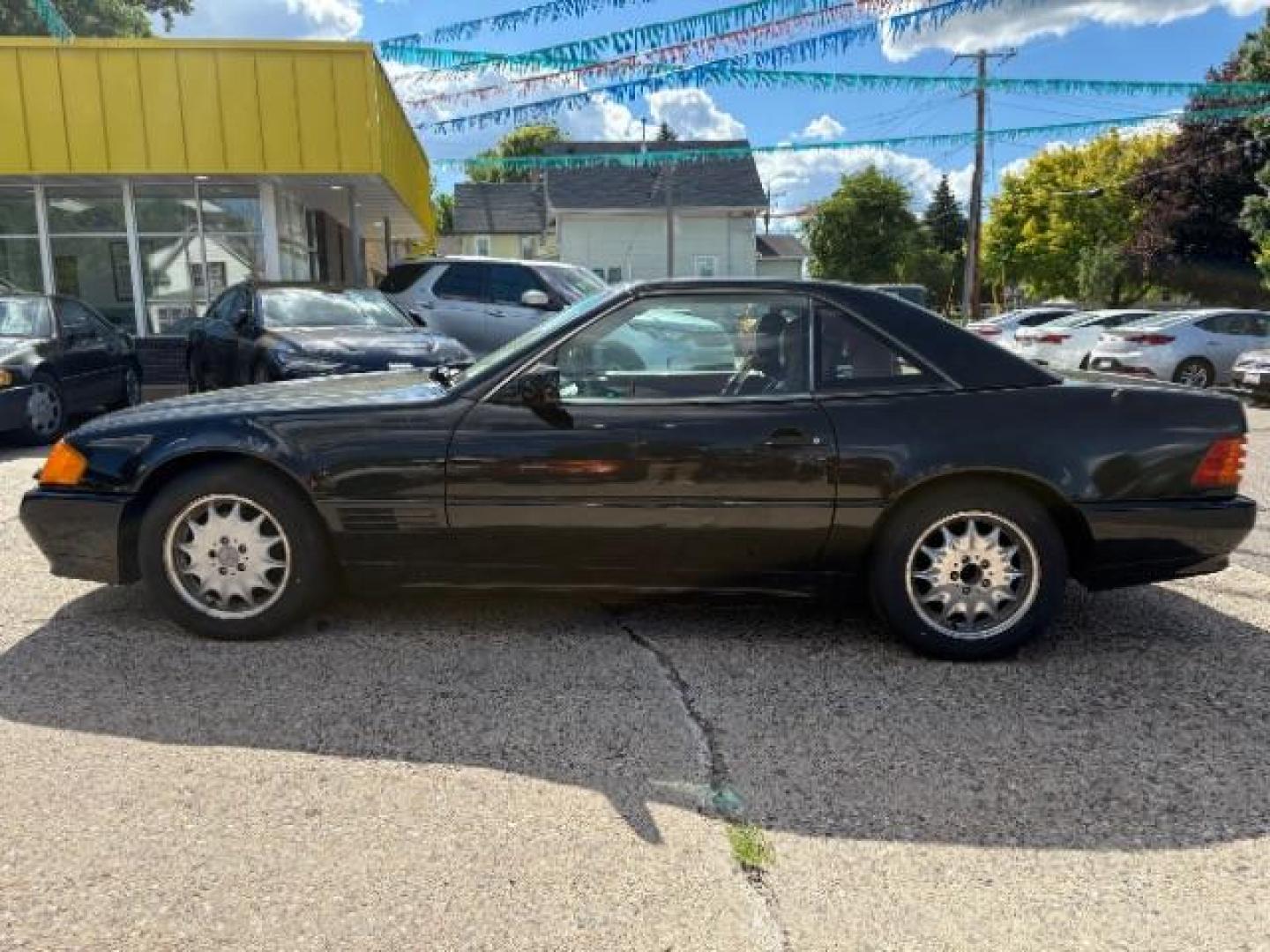 1994 BLACK Mercedes-Benz SL-Class SL500 Roadster (WDBFA67E1RF) with an 5.0L V8 DOHC 32V engine, 4-Speed Automatic transmission, located at 745 S Robert St, St. Paul, MN, 55107, (651) 222-2991, 44.923389, -93.081215- Photo#3