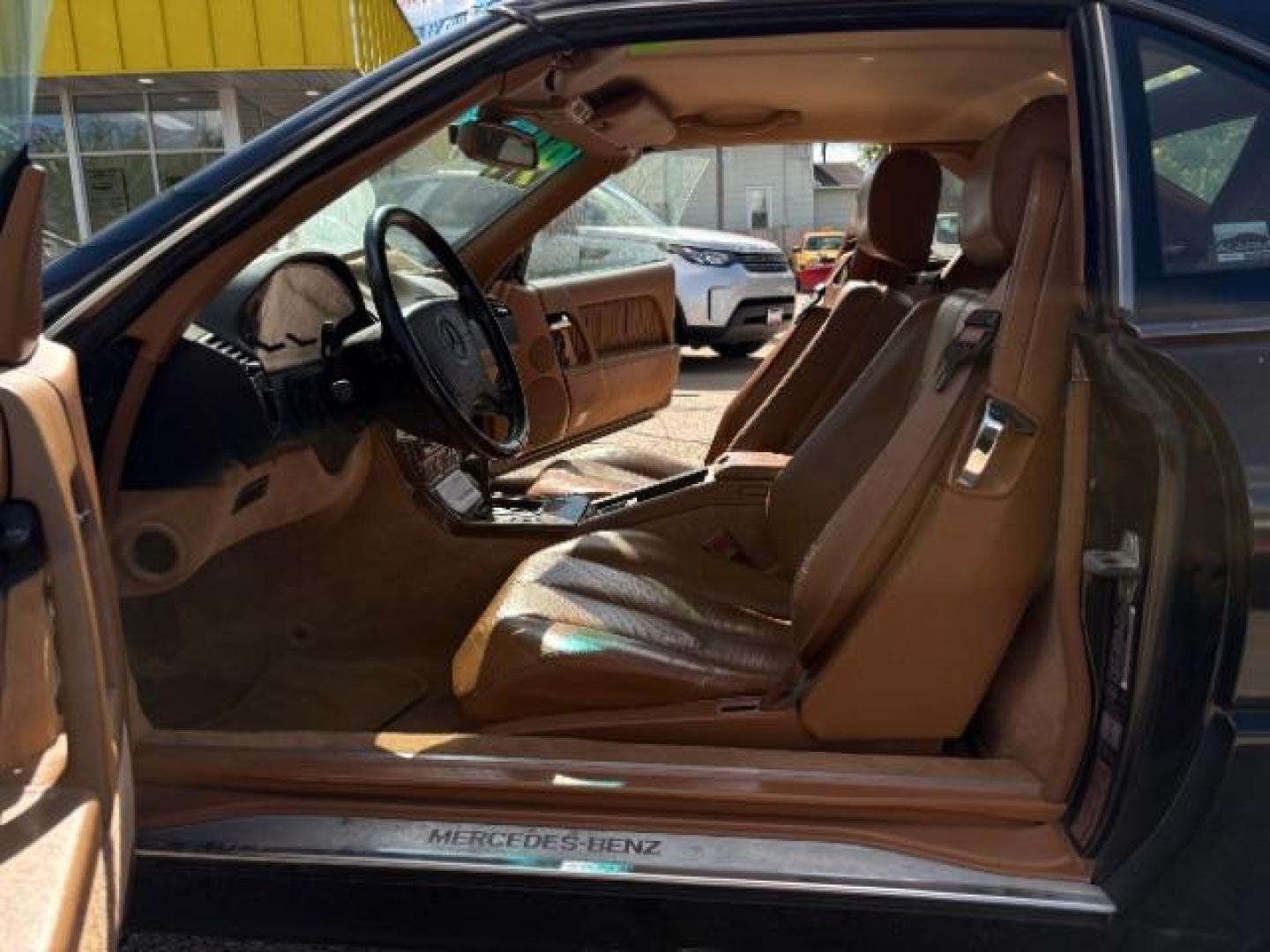 1994 BLACK Mercedes-Benz SL-Class SL500 Roadster (WDBFA67E1RF) with an 5.0L V8 DOHC 32V engine, 4-Speed Automatic transmission, located at 745 S Robert St, St. Paul, MN, 55107, (651) 222-2991, 44.923389, -93.081215- Photo#8