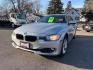 2014 Glacier Silver Metallic BMW 320i xDrive (WBA3C3C56EF) with an 2L I-4 gasoline direct injection engine, located at 745 S Robert St, St. Paul, MN, 55107, (651) 222-2991, 44.923389, -93.081215 - Photo#2