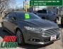 2016 Guard Metallic Ford Fusion Titanium (3FA6P0K95GR) with an 2.0L L4 DOHC 16V engine, 6-Speed Automatic transmission, located at 745 S Robert St, St. Paul, MN, 55107, (651) 222-2991, 44.923389, -93.081215 - Photo#0