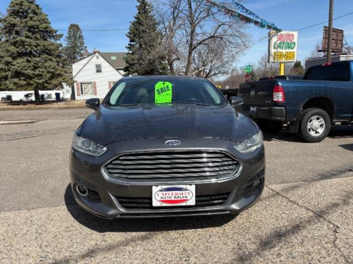 2016 Guard Metallic Ford Fusion Titanium (3FA6P0K95GR) with an 2.0L L4 DOHC 16V engine, 6-Speed Automatic transmission, located at 745 S Robert St, St. Paul, MN, 55107, (651) 222-2991, 44.923389, -93.081215 - Photo#2