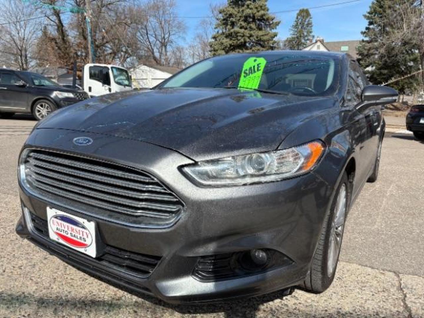 2016 Guard Metallic Ford Fusion Titanium (3FA6P0K95GR) with an 2.0L L4 DOHC 16V engine, 6-Speed Automatic transmission, located at 745 S Robert St, St. Paul, MN, 55107, (651) 222-2991, 44.923389, -93.081215 - Photo#3