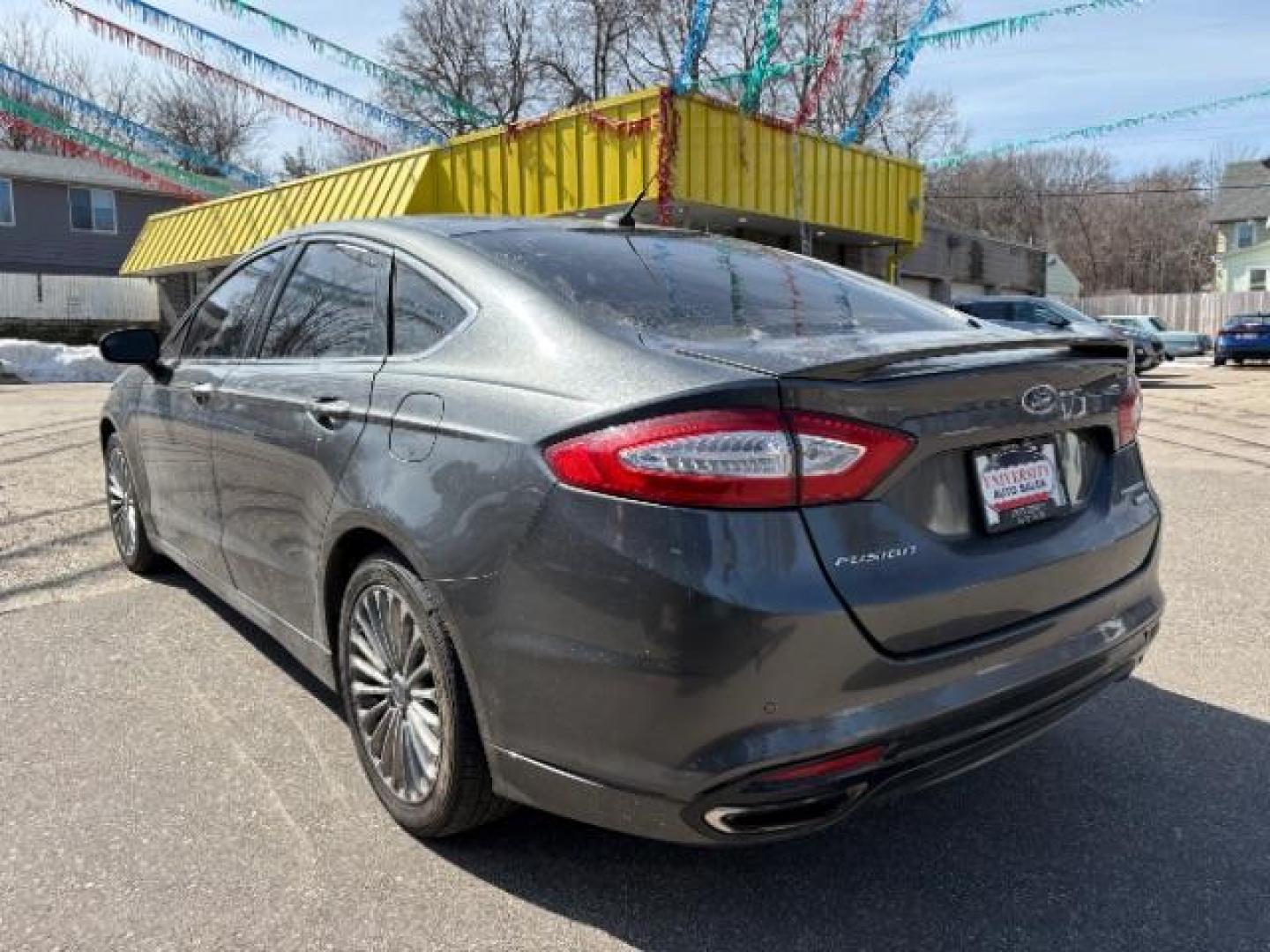 2016 Guard Metallic Ford Fusion Titanium (3FA6P0K95GR) with an 2.0L L4 DOHC 16V engine, 6-Speed Automatic transmission, located at 745 S Robert St, St. Paul, MN, 55107, (651) 222-2991, 44.923389, -93.081215 - Photo#4