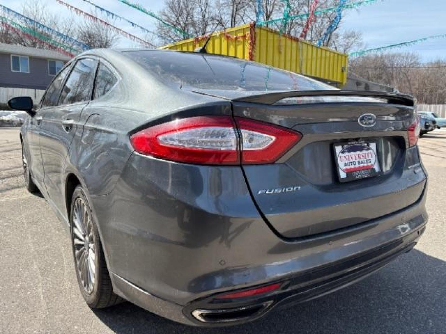 2016 Guard Metallic Ford Fusion Titanium (3FA6P0K95GR) with an 2.0L L4 DOHC 16V engine, 6-Speed Automatic transmission, located at 745 S Robert St, St. Paul, MN, 55107, (651) 222-2991, 44.923389, -93.081215 - Photo#5