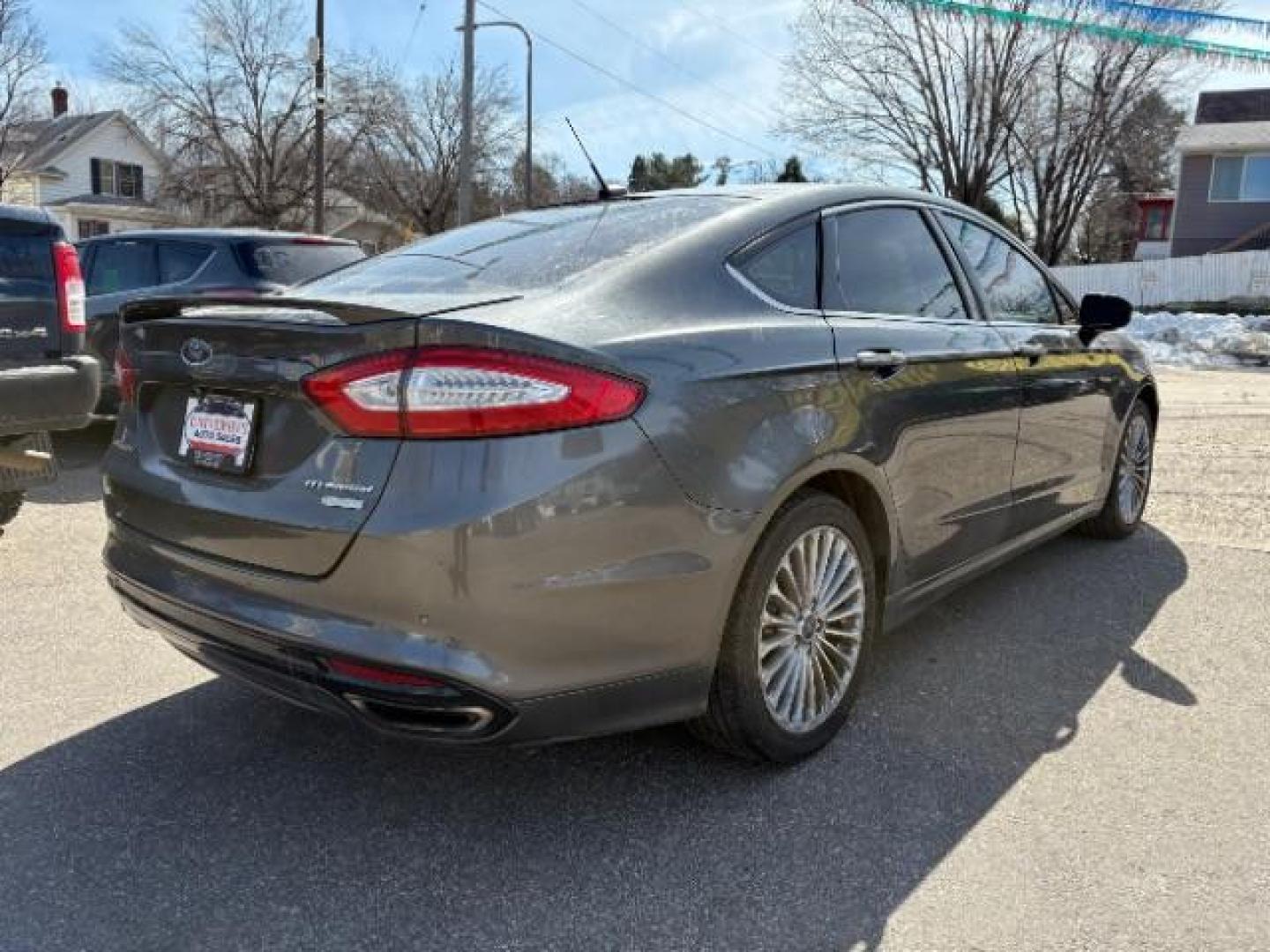 2016 Guard Metallic Ford Fusion Titanium (3FA6P0K95GR) with an 2.0L L4 DOHC 16V engine, 6-Speed Automatic transmission, located at 745 S Robert St, St. Paul, MN, 55107, (651) 222-2991, 44.923389, -93.081215 - Photo#8