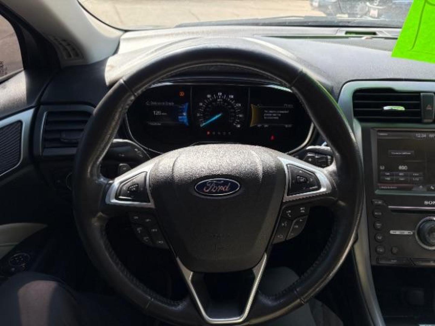 2016 Guard Metallic Ford Fusion Titanium (3FA6P0K95GR) with an 2.0L L4 DOHC 16V engine, 6-Speed Automatic transmission, located at 745 S Robert St, St. Paul, MN, 55107, (651) 222-2991, 44.923389, -93.081215 - Photo#10