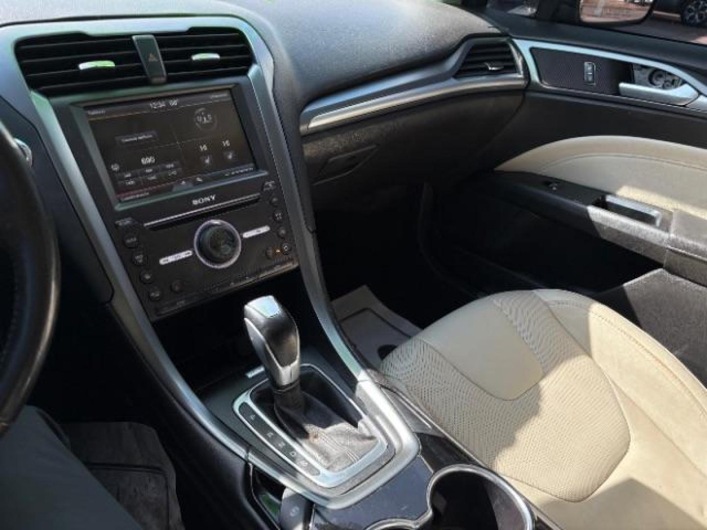 2016 Guard Metallic Ford Fusion Titanium (3FA6P0K95GR) with an 2.0L L4 DOHC 16V engine, 6-Speed Automatic transmission, located at 745 S Robert St, St. Paul, MN, 55107, (651) 222-2991, 44.923389, -93.081215 - Photo#11