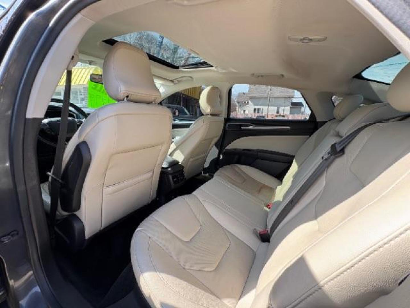 2016 Guard Metallic Ford Fusion Titanium (3FA6P0K95GR) with an 2.0L L4 DOHC 16V engine, 6-Speed Automatic transmission, located at 745 S Robert St, St. Paul, MN, 55107, (651) 222-2991, 44.923389, -93.081215 - Photo#13