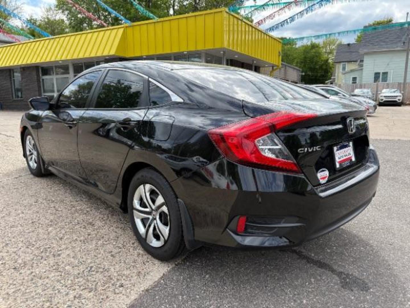 2018 Crystal Black Pearl Honda Civic LX (19XFC2F54JE) with an 2L I-4 DOHC engine, located at 745 S Robert St, St. Paul, MN, 55107, (651) 222-2991, 44.923389, -93.081215- Photo#4