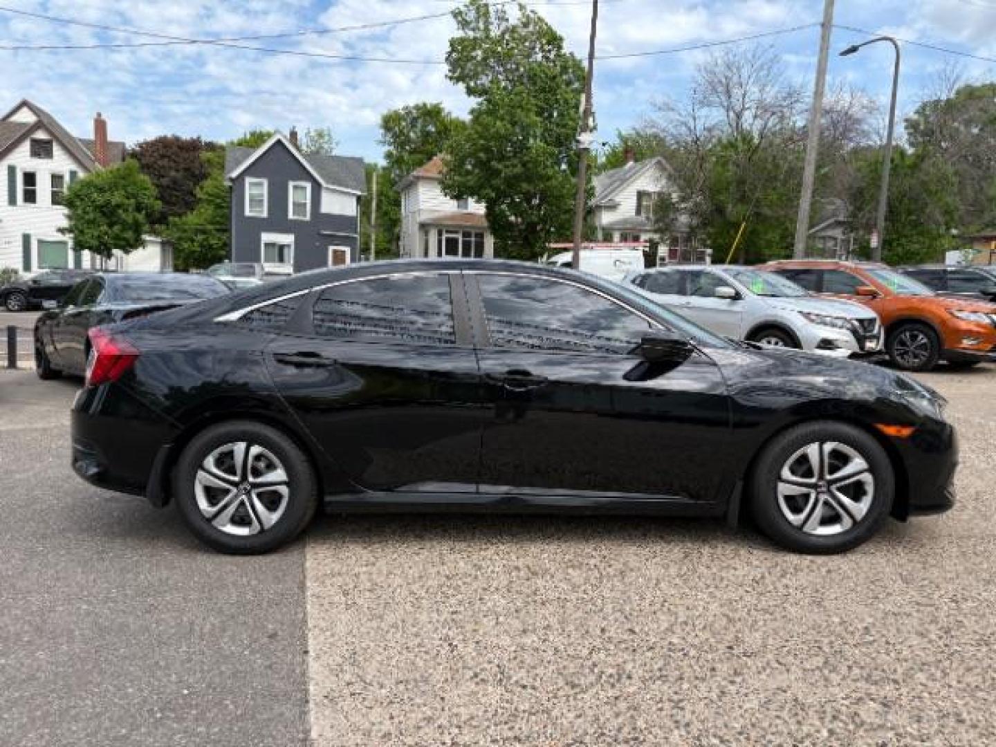 2018 Crystal Black Pearl Honda Civic LX (19XFC2F54JE) with an 2L I-4 DOHC engine, located at 745 S Robert St, St. Paul, MN, 55107, (651) 222-2991, 44.923389, -93.081215- Photo#7