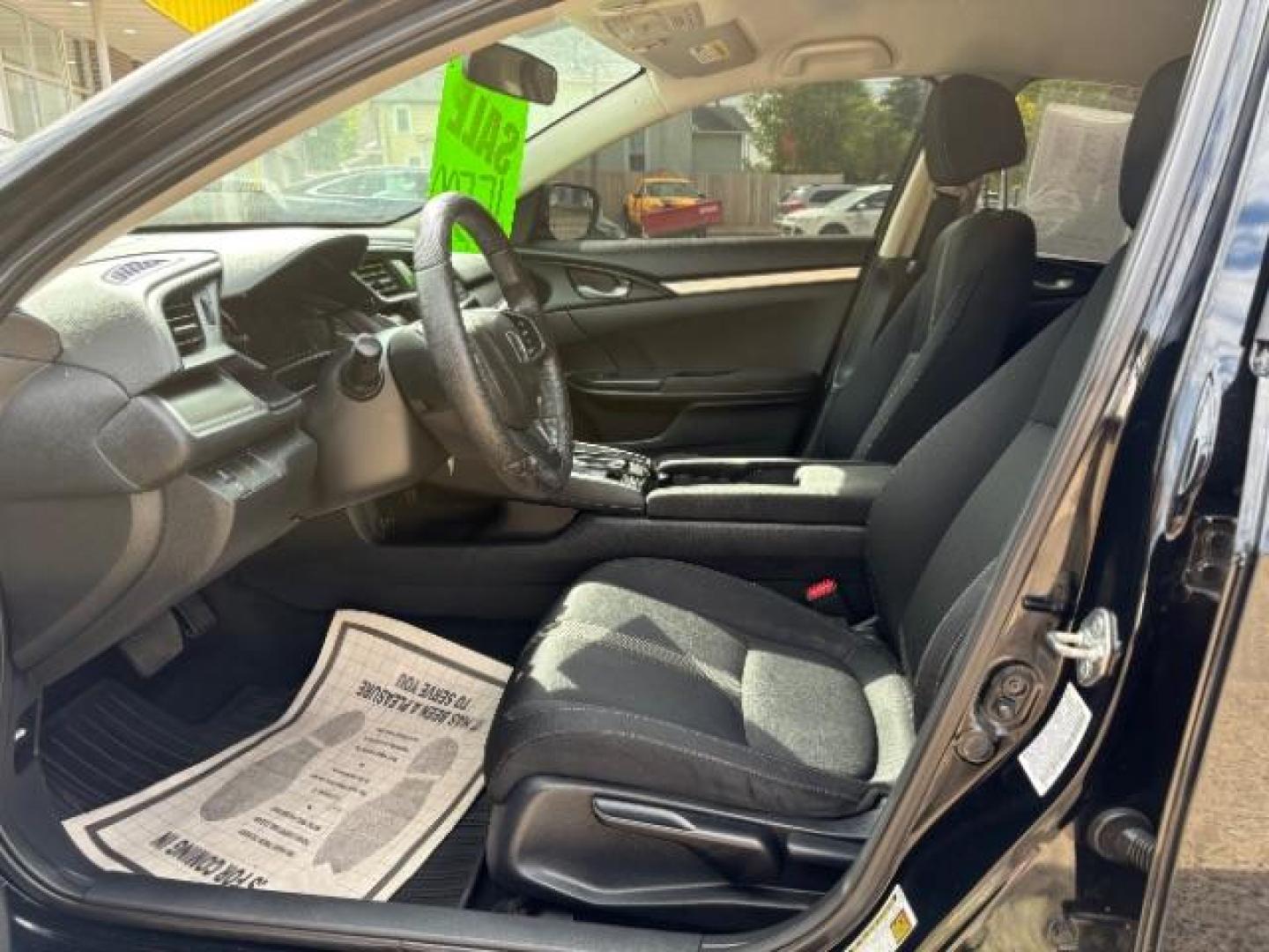 2018 Crystal Black Pearl Honda Civic LX (19XFC2F54JE) with an 2L I-4 DOHC engine, located at 745 S Robert St, St. Paul, MN, 55107, (651) 222-2991, 44.923389, -93.081215- Photo#12
