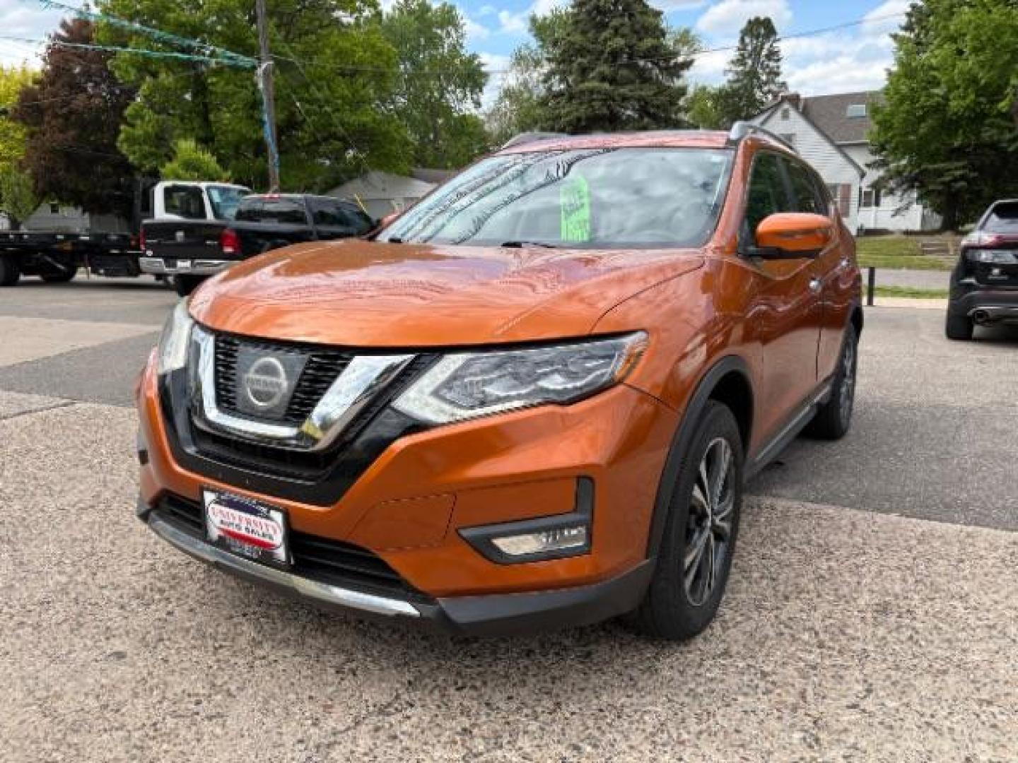 2017 Monarch Orange Nissan Rogue SL AWD (5N1AT2MVXHC) with an 2.5L L4 DOHC 16V engine, Continuously Variable Transmission transmission, located at 745 S Robert St, St. Paul, MN, 55107, (651) 222-2991, 44.923389, -93.081215 - Photo#2