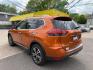 2017 Monarch Orange Nissan Rogue SL AWD (5N1AT2MVXHC) with an 2.5L L4 DOHC 16V engine, Continuously Variable Transmission transmission, located at 745 S Robert St, St. Paul, MN, 55107, (651) 222-2991, 44.923389, -93.081215 - Photo#4