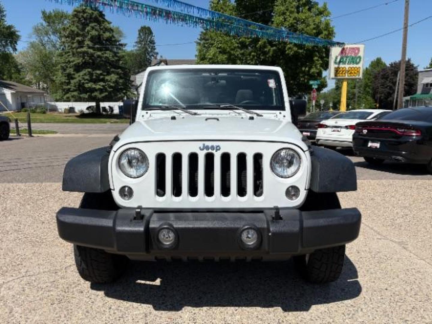 2016 Bright White Clearcoat Jeep Wrangler Unlimited Sport (1C4BJWDG5GL) with an Pentastar 3.6L V-6 DOHC engine, located at 745 S Robert St, St. Paul, MN, 55107, (651) 222-2991, 44.923389, -93.081215 - Photo#1