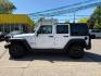 2016 Bright White Clearcoat Jeep Wrangler Unlimited Sport (1C4BJWDG5GL) with an Pentastar 3.6L V-6 DOHC engine, located at 745 S Robert St, St. Paul, MN, 55107, (651) 222-2991, 44.923389, -93.081215 - Photo#2