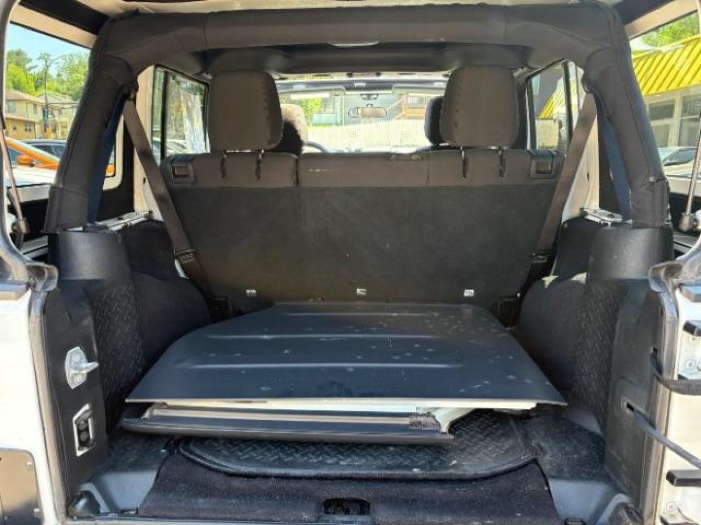 2016 Bright White Clearcoat Jeep Wrangler Unlimited Sport (1C4BJWDG5GL) with an Pentastar 3.6L V-6 DOHC engine, located at 745 S Robert St, St. Paul, MN, 55107, (651) 222-2991, 44.923389, -93.081215 - Photo#6