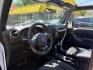 2016 Bright White Clearcoat Jeep Wrangler Unlimited Sport (1C4BJWDG5GL) with an Pentastar 3.6L V-6 DOHC engine, located at 745 S Robert St, St. Paul, MN, 55107, (651) 222-2991, 44.923389, -93.081215 - Photo#12