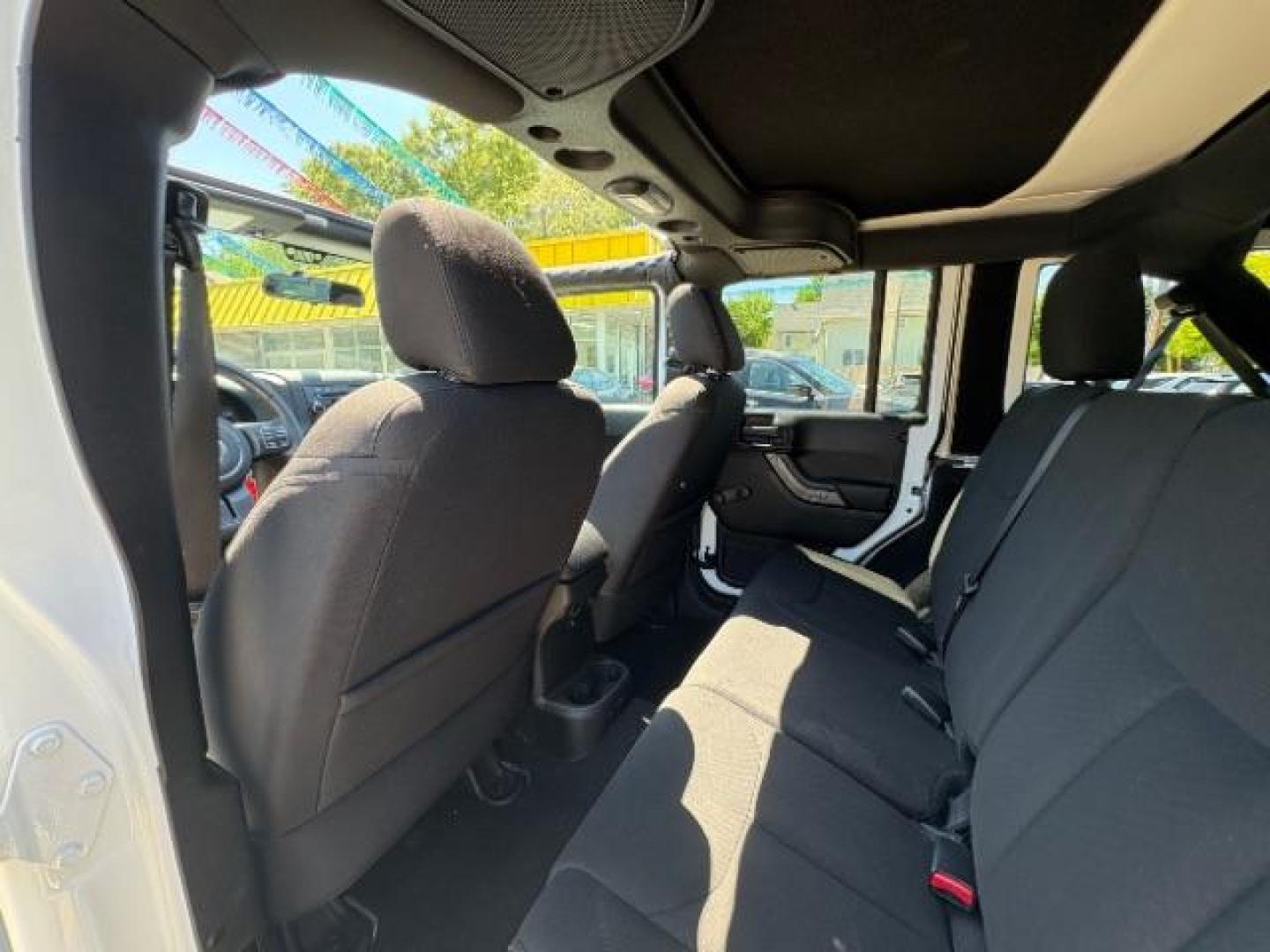 2016 Bright White Clearcoat Jeep Wrangler Unlimited Sport (1C4BJWDG5GL) with an Pentastar 3.6L V-6 DOHC engine, located at 745 S Robert St, St. Paul, MN, 55107, (651) 222-2991, 44.923389, -93.081215 - Photo#17