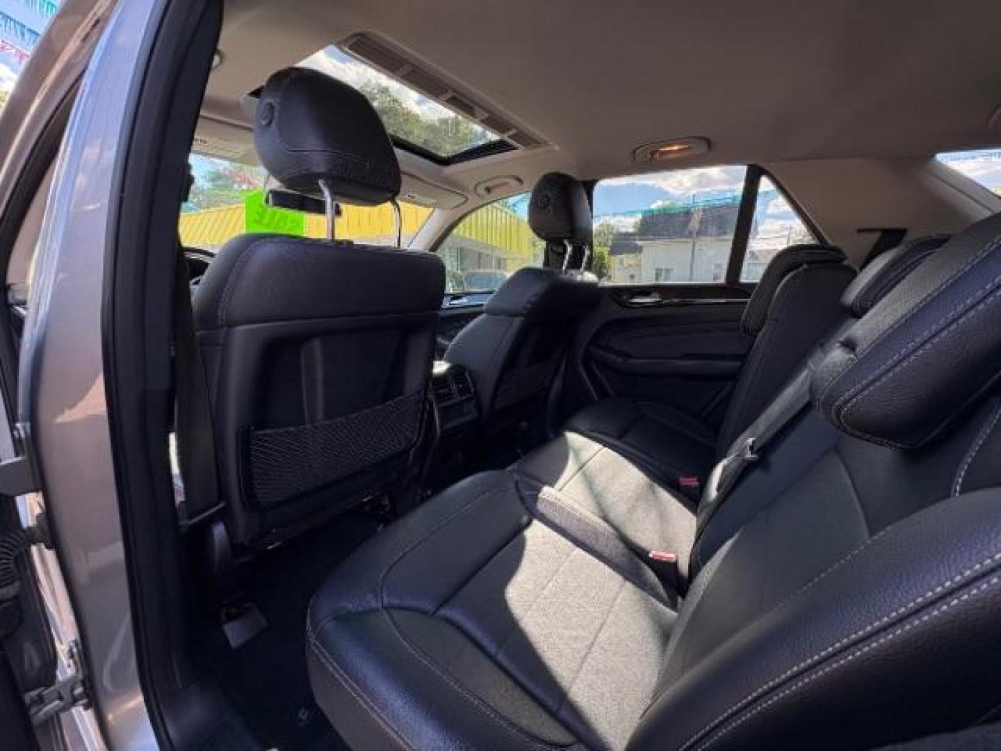 2015 Iridium Silver Metallic Mercedes-Benz ML 350 4MATIC (4JGDA5HB7FA) with an 3.5L V-6 gasoline direct injection engine, located at 745 S Robert St, St. Paul, MN, 55107, (651) 222-2991, 44.923389, -93.081215 - Photo#22