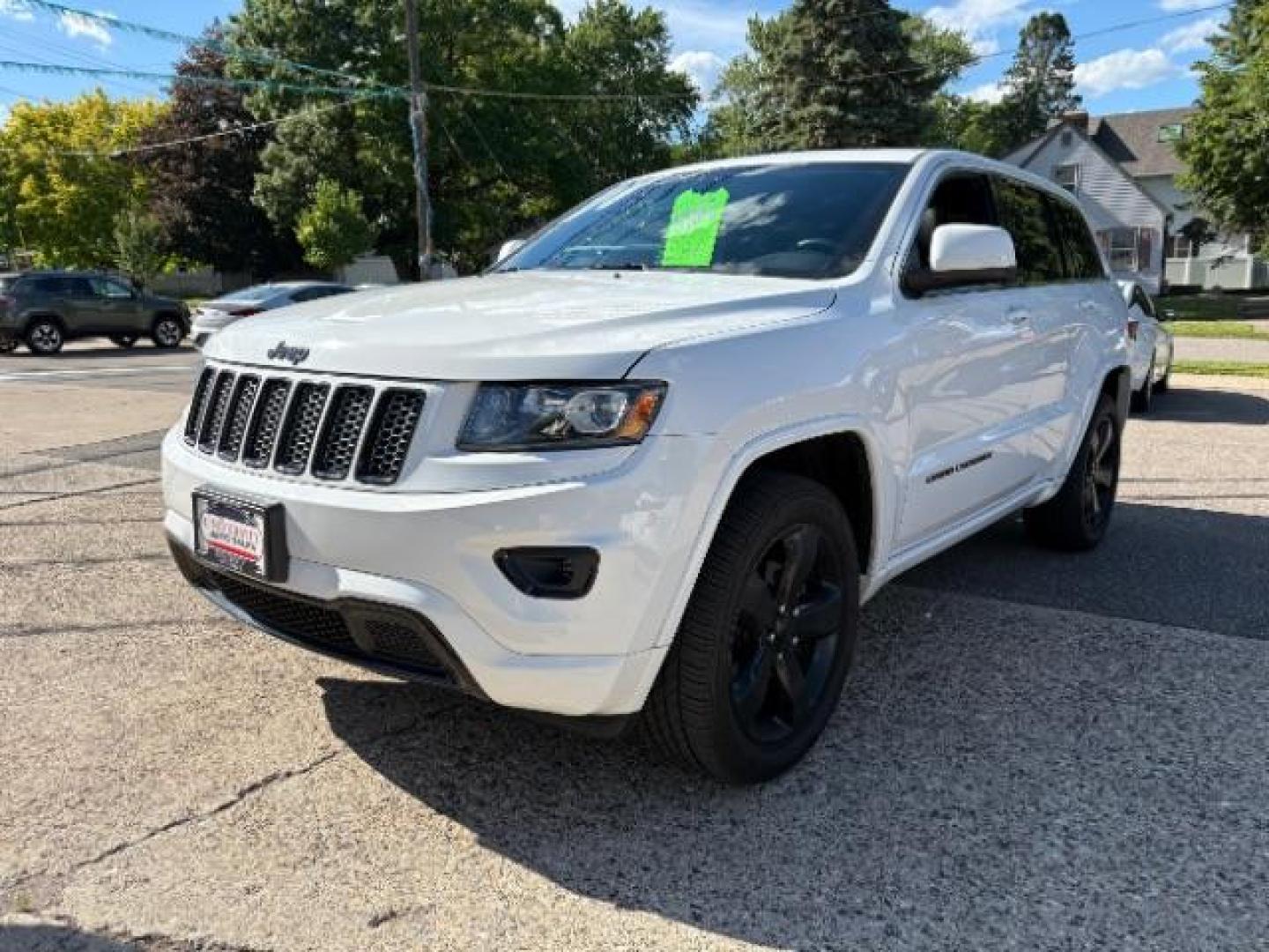 2015 Bright White Clearcoat Jeep Grand Cherokee Altitude (1C4RJFAG3FC) with an 3.6L V-6 DOHC engine, located at 745 S Robert St, St. Paul, MN, 55107, (651) 222-2991, 44.923389, -93.081215- Photo#2