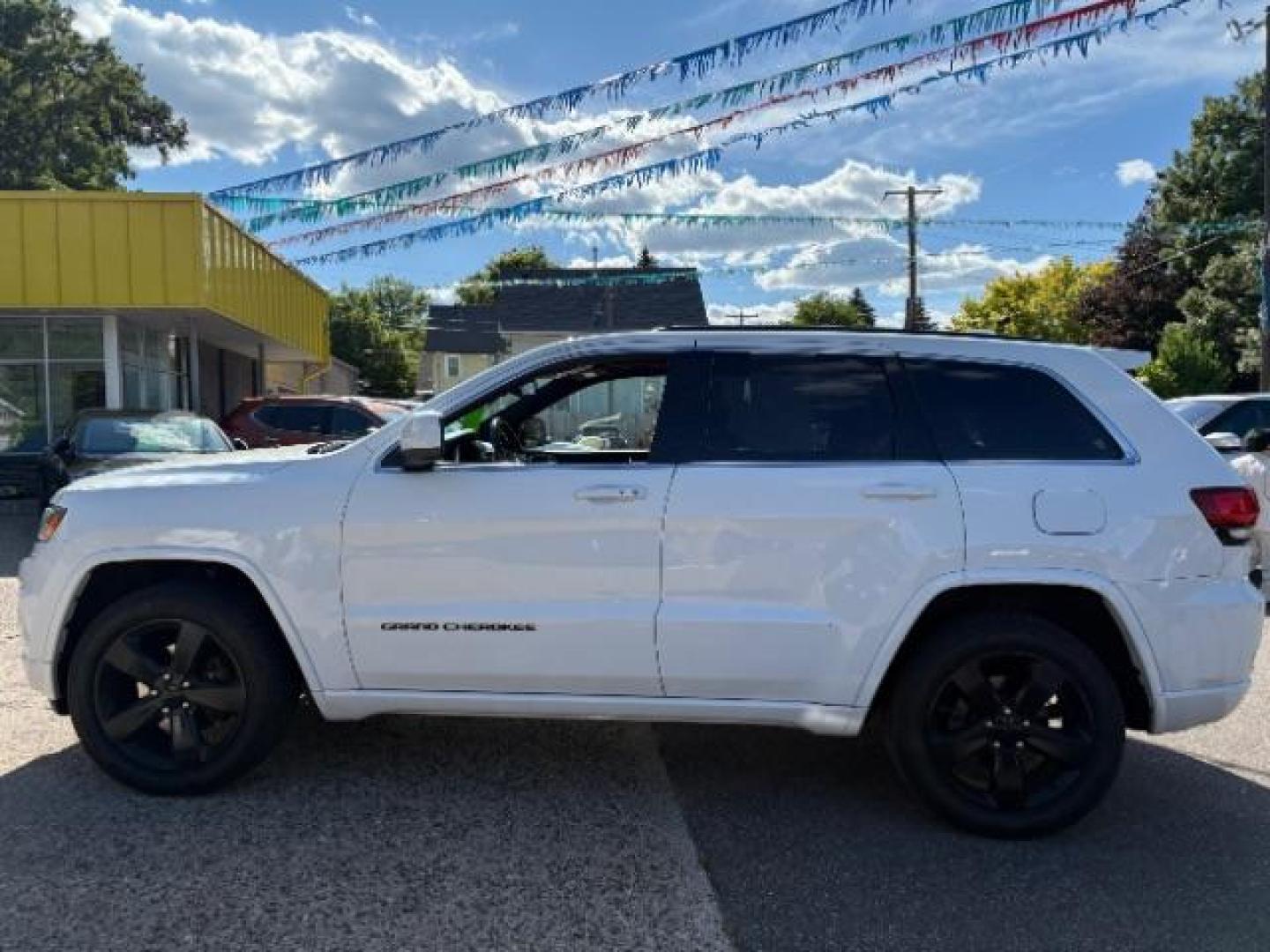 2015 Bright White Clearcoat Jeep Grand Cherokee Altitude (1C4RJFAG3FC) with an 3.6L V-6 DOHC engine, located at 745 S Robert St, St. Paul, MN, 55107, (651) 222-2991, 44.923389, -93.081215- Photo#3