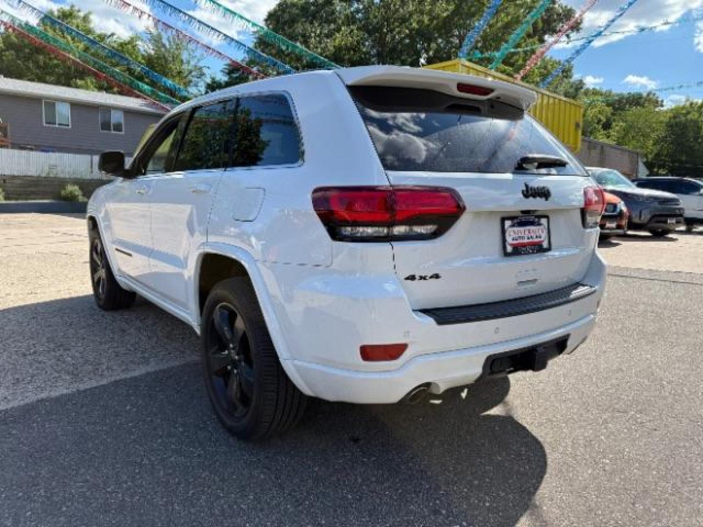 2015 Bright White Clearcoat Jeep Grand Cherokee Altitude (1C4RJFAG3FC) with an 3.6L V-6 DOHC engine, located at 745 S Robert St, St. Paul, MN, 55107, (651) 222-2991, 44.923389, -93.081215- Photo#4