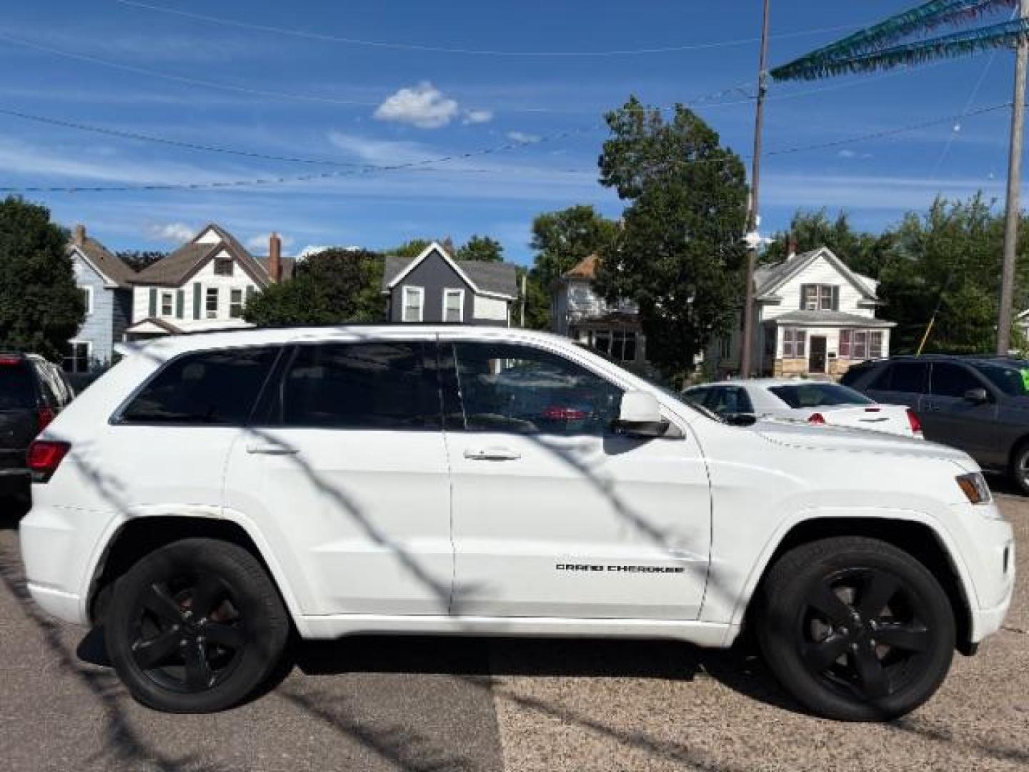 2015 Bright White Clearcoat Jeep Grand Cherokee Altitude (1C4RJFAG3FC) with an 3.6L V-6 DOHC engine, located at 745 S Robert St, St. Paul, MN, 55107, (651) 222-2991, 44.923389, -93.081215- Photo#9