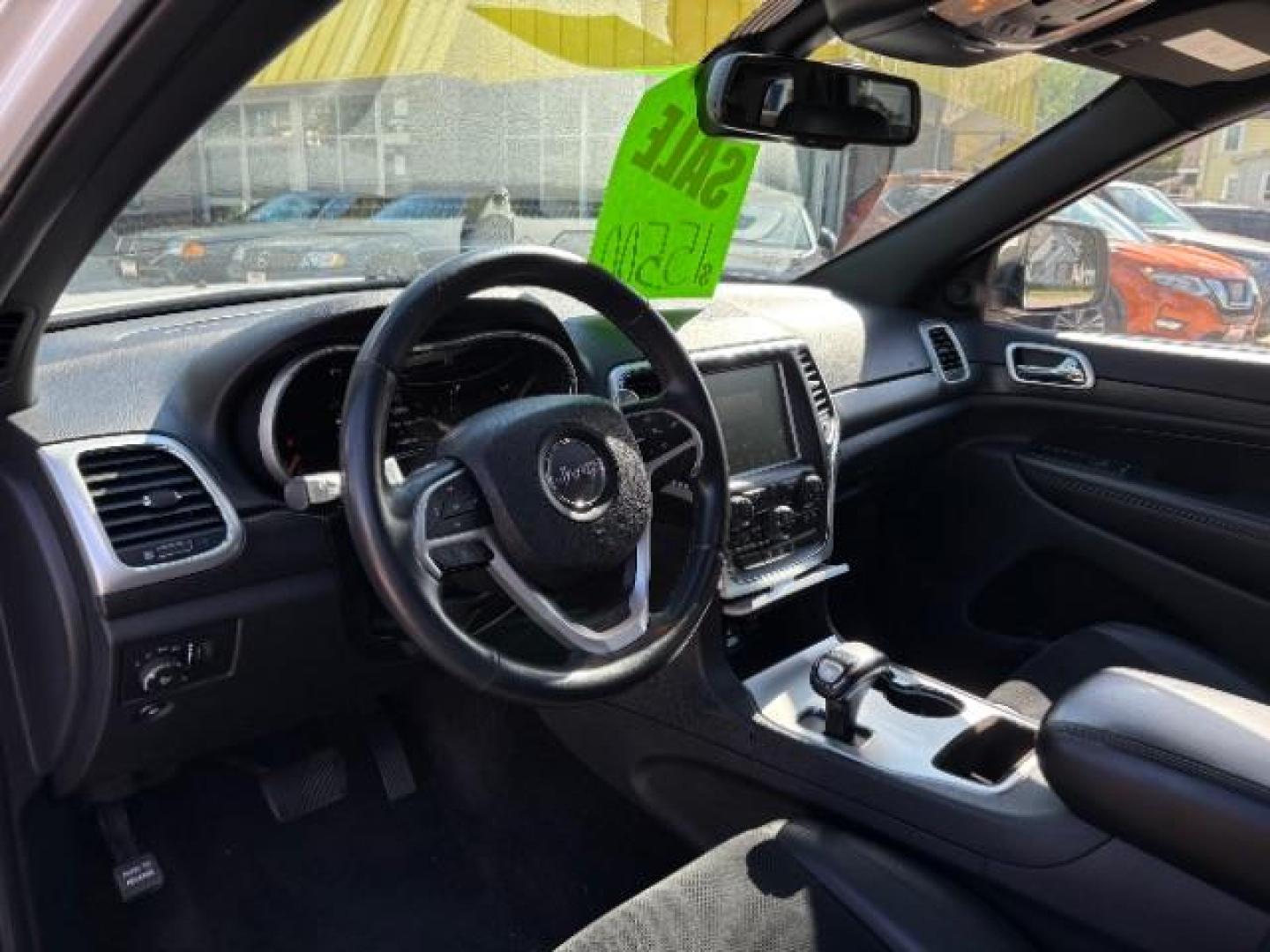 2015 Bright White Clearcoat Jeep Grand Cherokee Altitude (1C4RJFAG3FC) with an 3.6L V-6 DOHC engine, located at 745 S Robert St, St. Paul, MN, 55107, (651) 222-2991, 44.923389, -93.081215- Photo#11