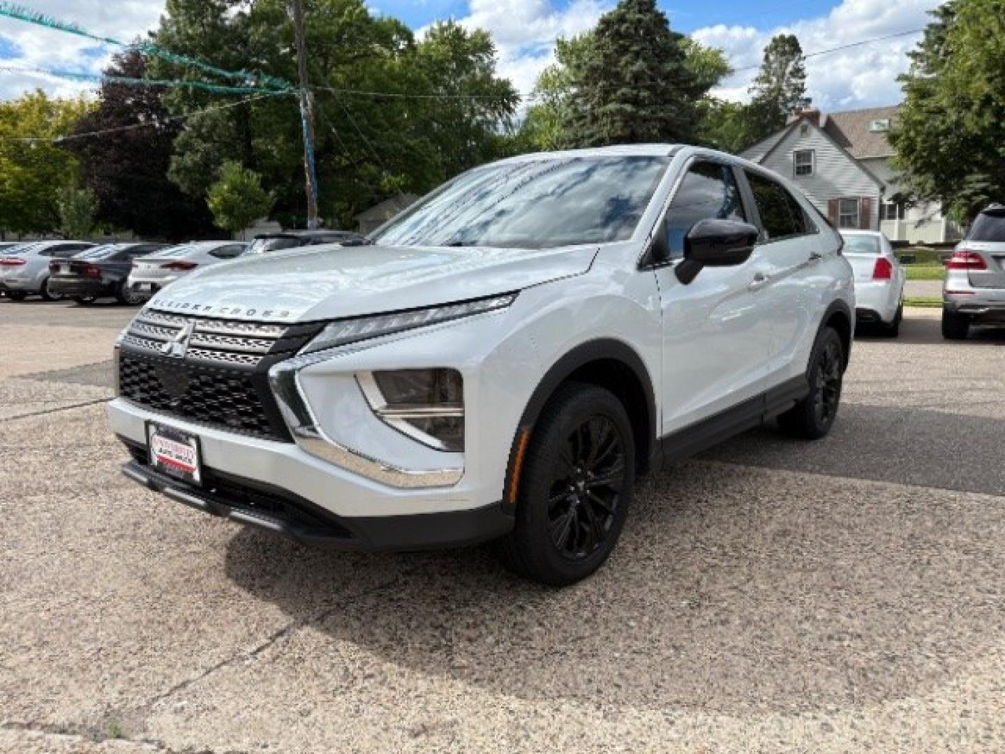 2022 White Diamond Mitsubishi Eclipse Cross LE S-AWC (JA4ATVAAXNZ) with an 1.5L I-4 gasoline direct injection engine, located at 745 S Robert St, St. Paul, MN, 55107, (651) 222-2991, 44.923389, -93.081215- Photo#2