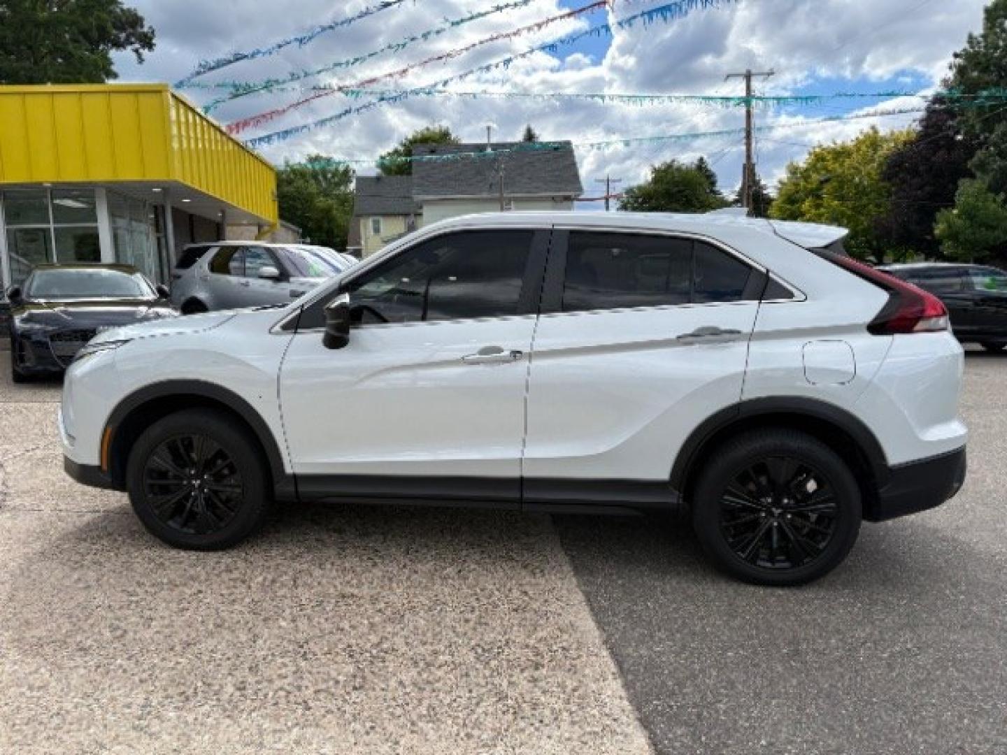 2022 White Diamond Mitsubishi Eclipse Cross LE S-AWC (JA4ATVAAXNZ) with an 1.5L I-4 gasoline direct injection engine, located at 745 S Robert St, St. Paul, MN, 55107, (651) 222-2991, 44.923389, -93.081215- Photo#3