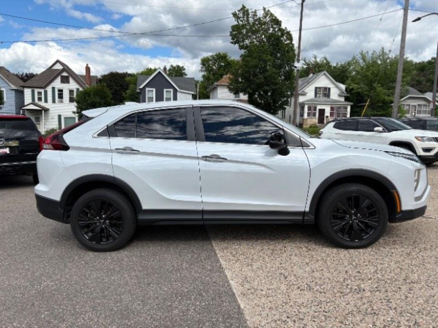 2022 White Diamond Mitsubishi Eclipse Cross LE S-AWC (JA4ATVAAXNZ) with an 1.5L I-4 gasoline direct injection engine, located at 745 S Robert St, St. Paul, MN, 55107, (651) 222-2991, 44.923389, -93.081215- Photo#9