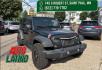 2017 Black Clearcoat Jeep Wrangler Unlimited Sport (1C4BJWDG5HL) with an Pentastar 3.6L V-6 DOHC engine, located at 745 S Robert St, St. Paul, MN, 55107, (651) 222-2991, 44.923389, -93.081215- Photo#0