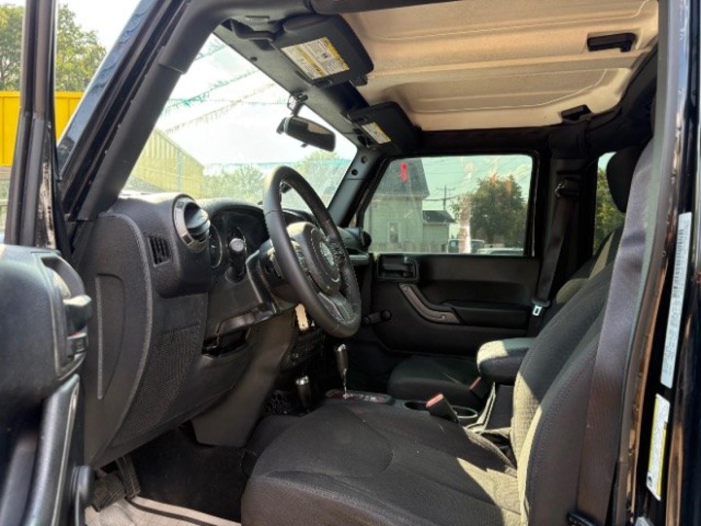 2017 Black Clearcoat Jeep Wrangler Unlimited Sport (1C4BJWDG5HL) with an Pentastar 3.6L V-6 DOHC engine, located at 745 S Robert St, St. Paul, MN, 55107, (651) 222-2991, 44.923389, -93.081215- Photo#8