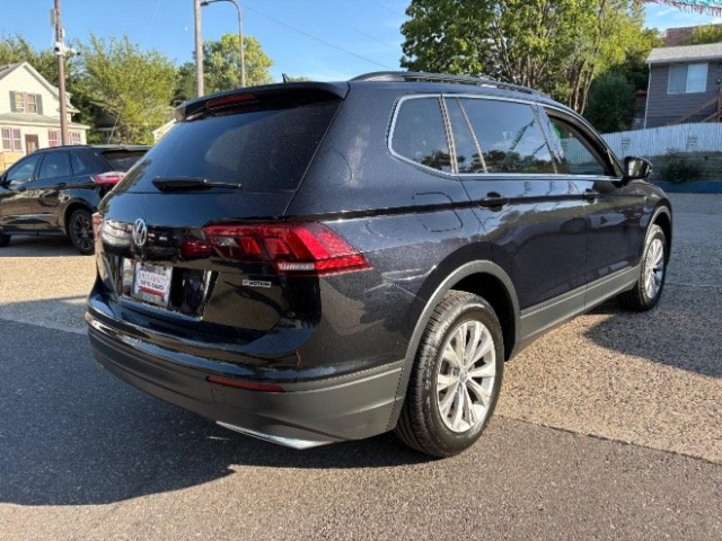 2019 Deep Black Pearl Volkswagen Tiguan 2.0T SE | 2.0T SEL | 2.0T SEL R-Line | 2.0T SEL R-Line Black (3VV2B7AXXKM) with an 2L I-4 direct injection engine, located at 745 S Robert St, St. Paul, MN, 55107, (651) 222-2991, 44.923389, -93.081215- Photo#8