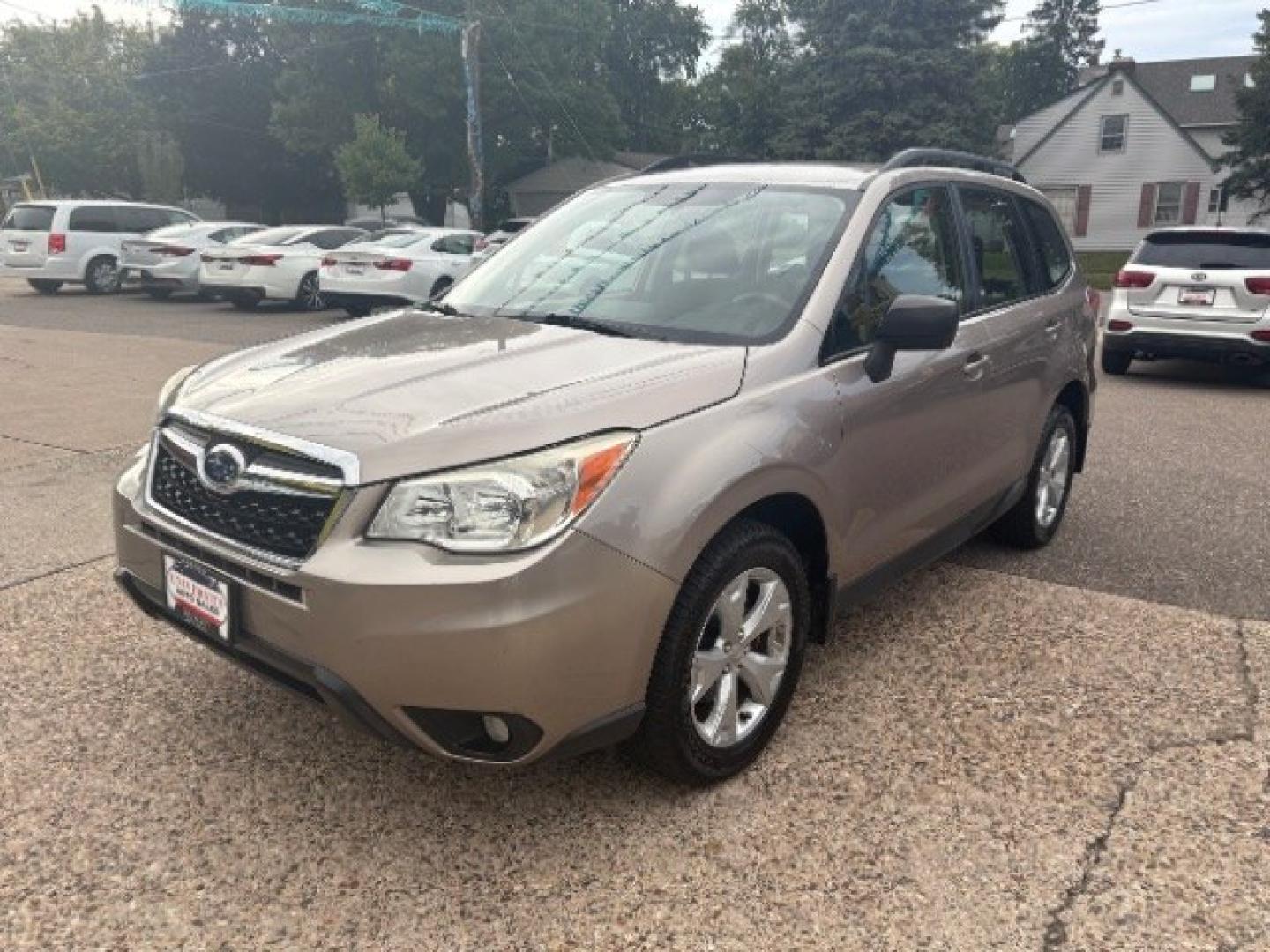 2015 Burnished Bronze Metallic Subaru Forester 2.5i (JF2SJABC0FH) with an 2.5L H-4 DOHC engine, located at 745 S Robert St, St. Paul, MN, 55107, (651) 222-2991, 44.923389, -93.081215- Photo#2