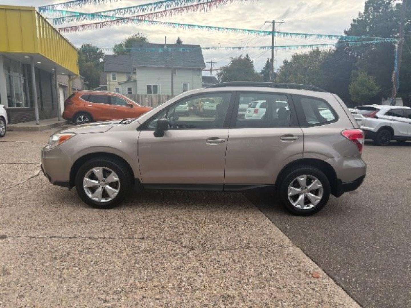 2015 Burnished Bronze Metallic Subaru Forester 2.5i (JF2SJABC0FH) with an 2.5L H-4 DOHC engine, located at 745 S Robert St, St. Paul, MN, 55107, (651) 222-2991, 44.923389, -93.081215- Photo#3