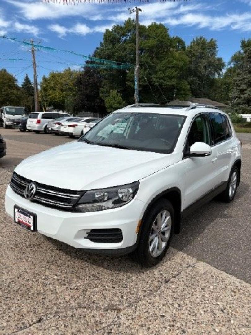 2017 Pure White Volkswagen Tiguan 2.0T Wolfsburg Edition (WVGSV7AX5HK) with an 2L I-4 direct injection engine, located at 745 S Robert St, St. Paul, MN, 55107, (651) 222-2991, 44.923389, -93.081215- Photo#2
