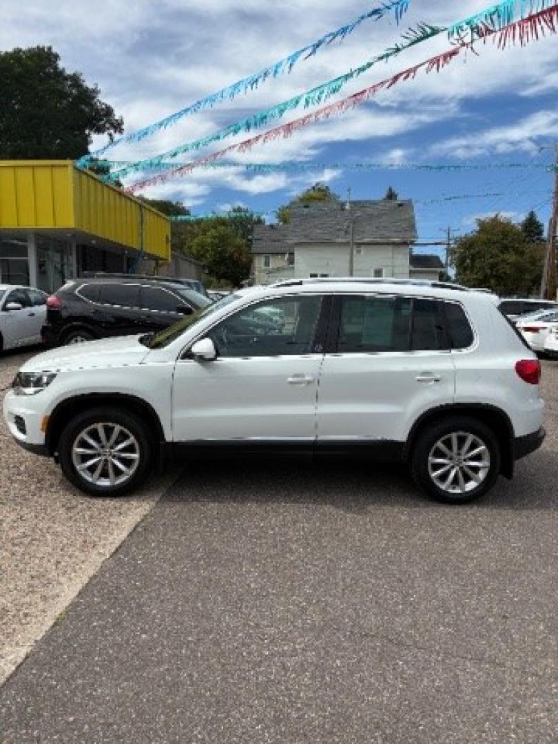 2017 Pure White Volkswagen Tiguan 2.0T Wolfsburg Edition (WVGSV7AX5HK) with an 2L I-4 direct injection engine, located at 745 S Robert St, St. Paul, MN, 55107, (651) 222-2991, 44.923389, -93.081215- Photo#3