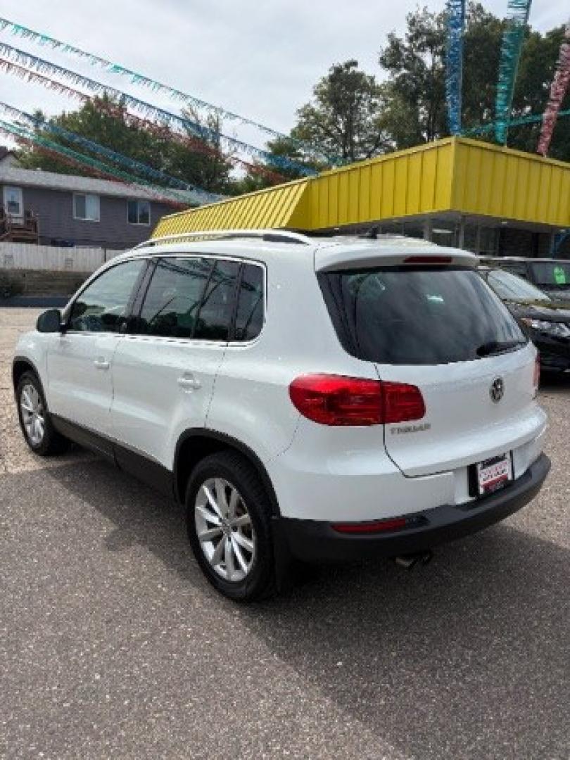 2017 Pure White Volkswagen Tiguan 2.0T Wolfsburg Edition (WVGSV7AX5HK) with an 2L I-4 direct injection engine, located at 745 S Robert St, St. Paul, MN, 55107, (651) 222-2991, 44.923389, -93.081215- Photo#4