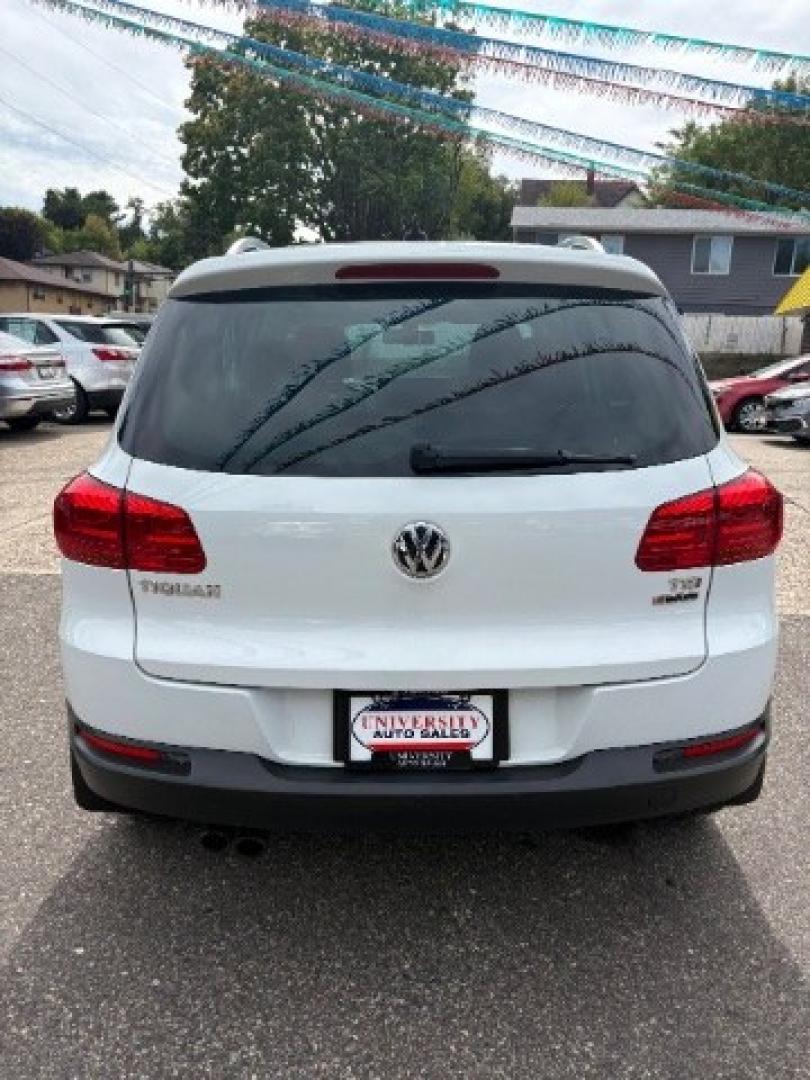 2017 Pure White Volkswagen Tiguan 2.0T Wolfsburg Edition (WVGSV7AX5HK) with an 2L I-4 direct injection engine, located at 745 S Robert St, St. Paul, MN, 55107, (651) 222-2991, 44.923389, -93.081215- Photo#5