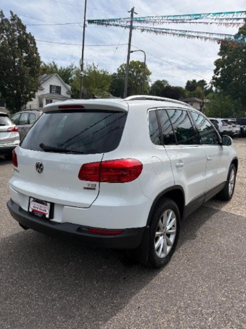 2017 Pure White Volkswagen Tiguan 2.0T Wolfsburg Edition (WVGSV7AX5HK) with an 2L I-4 direct injection engine, located at 745 S Robert St, St. Paul, MN, 55107, (651) 222-2991, 44.923389, -93.081215- Photo#6