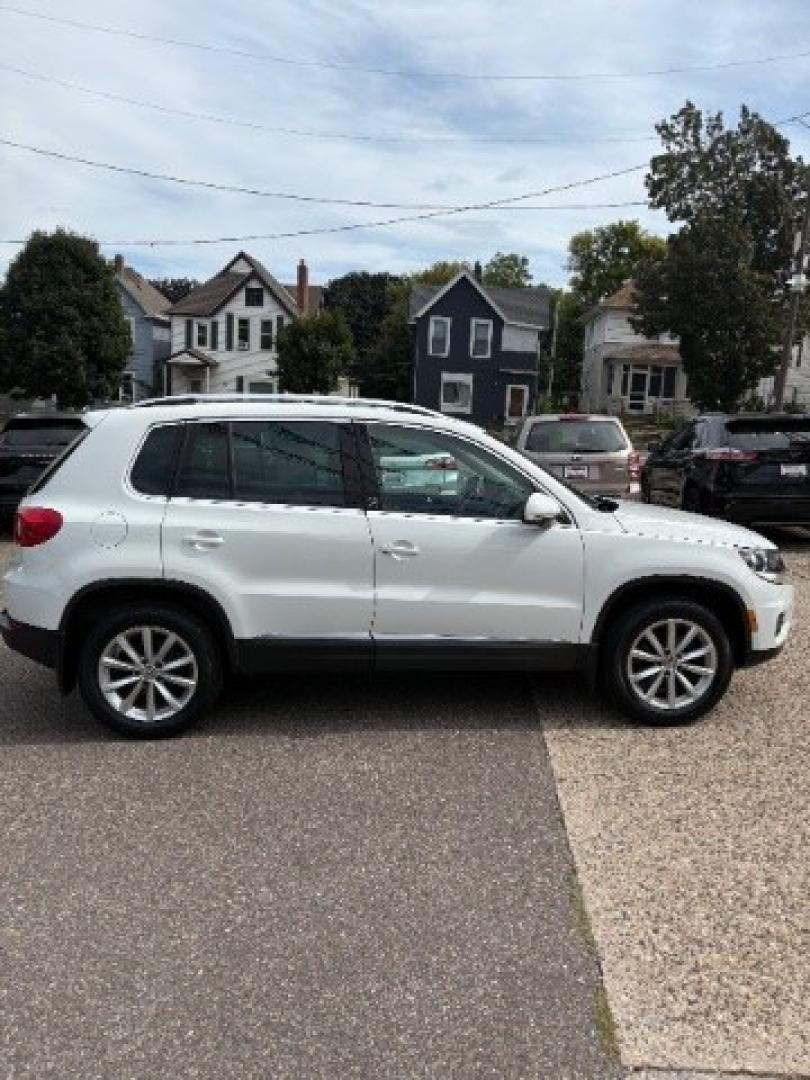 2017 Pure White Volkswagen Tiguan 2.0T Wolfsburg Edition (WVGSV7AX5HK) with an 2L I-4 direct injection engine, located at 745 S Robert St, St. Paul, MN, 55107, (651) 222-2991, 44.923389, -93.081215- Photo#7