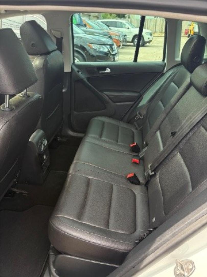 2017 Pure White Volkswagen Tiguan 2.0T Wolfsburg Edition (WVGSV7AX5HK) with an 2L I-4 direct injection engine, located at 745 S Robert St, St. Paul, MN, 55107, (651) 222-2991, 44.923389, -93.081215- Photo#14